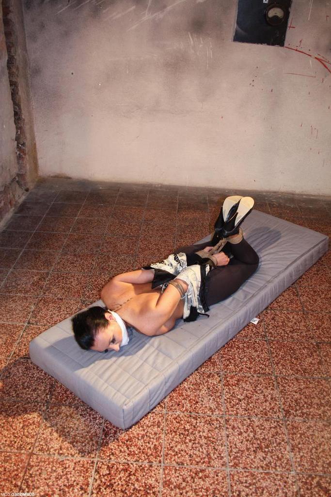 16P Poor Petra is left hogtied and gagged face down on a mattress