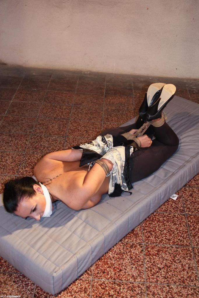 16P Poor Petra is left hogtied and gagged face down on a mattress