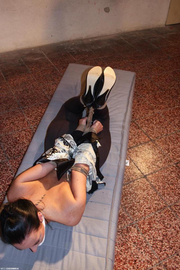 16P Poor Petra is left hogtied and gagged face down on a mattress