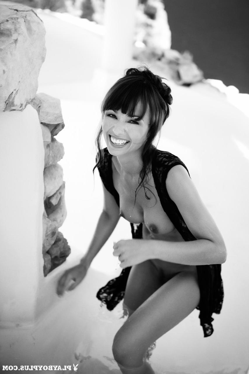 13P Irresistible smiley centerfold Melanie Meijer suns her gorgeous natural tits