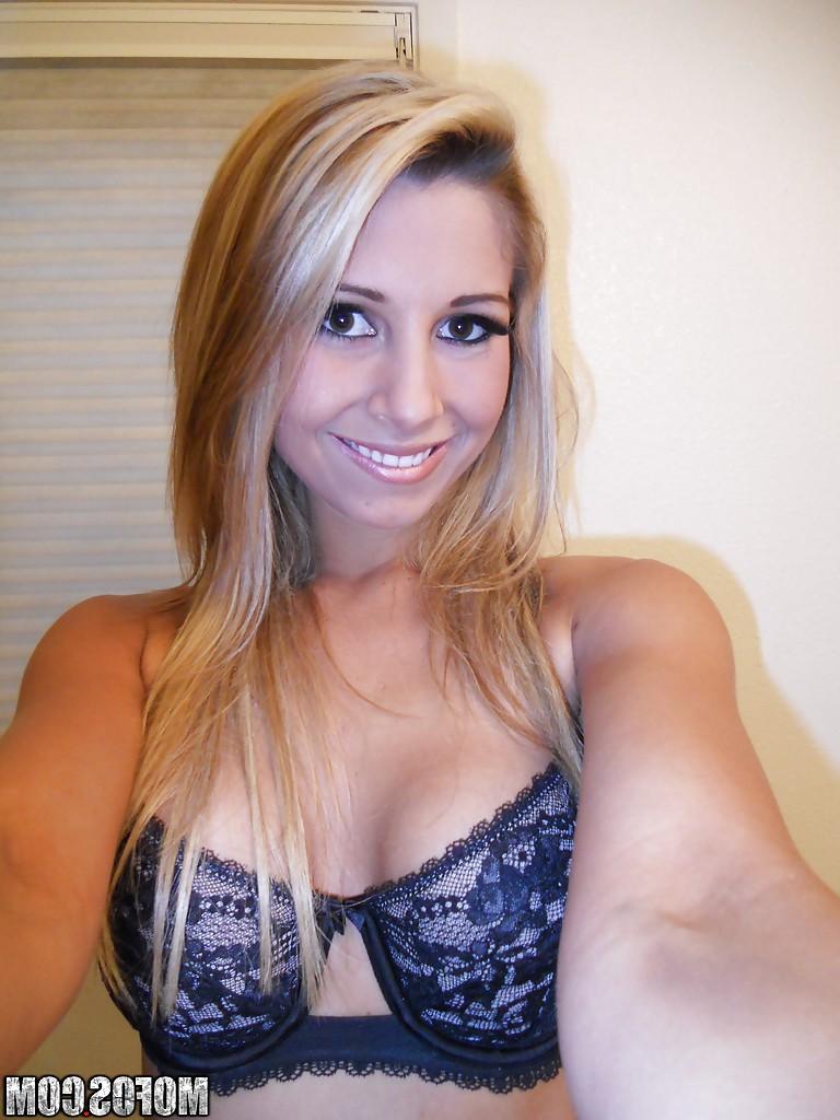 16P Natalie Vegas picturing herself and stripping off her lacy lingerie top