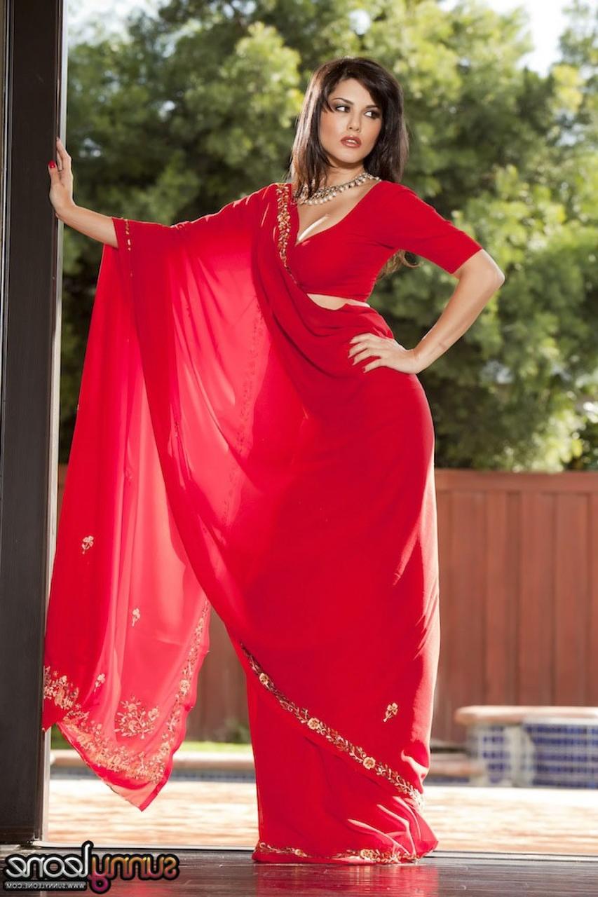 20P Brunette Indian goddess Sunny Leone teases with her big tits outdoors