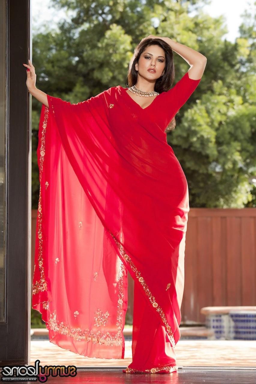 20P Brunette Indian goddess Sunny Leone teases with her big tits outdoors