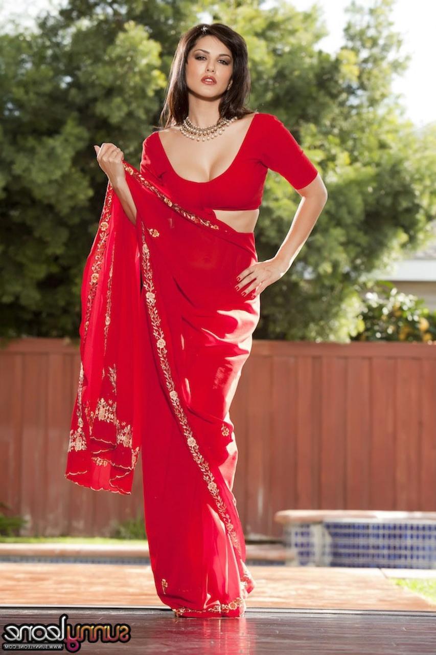 20P Brunette Indian goddess Sunny Leone teases with her big tits outdoors