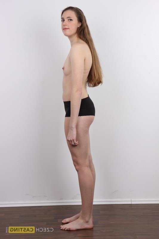 20P 18 year old amateur Alena stands naked after removing clothes and boots