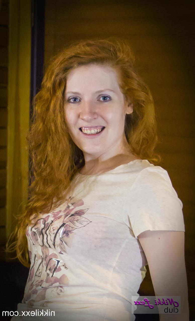 16P Redheaded MILF Nikki Lexx reveals her lovely big tits and spreads her hole