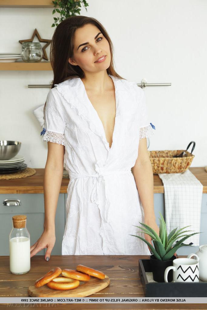 18P Beautiful teen Alise Moreno Downs a pitcher of milk before getting bare naked