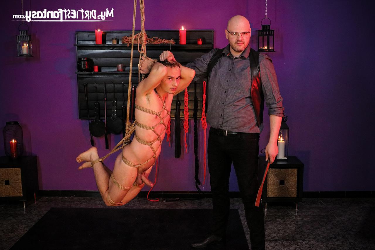 20P Hot twink Liam Butler gets a BJ during a BDSM session with The Puppeteer