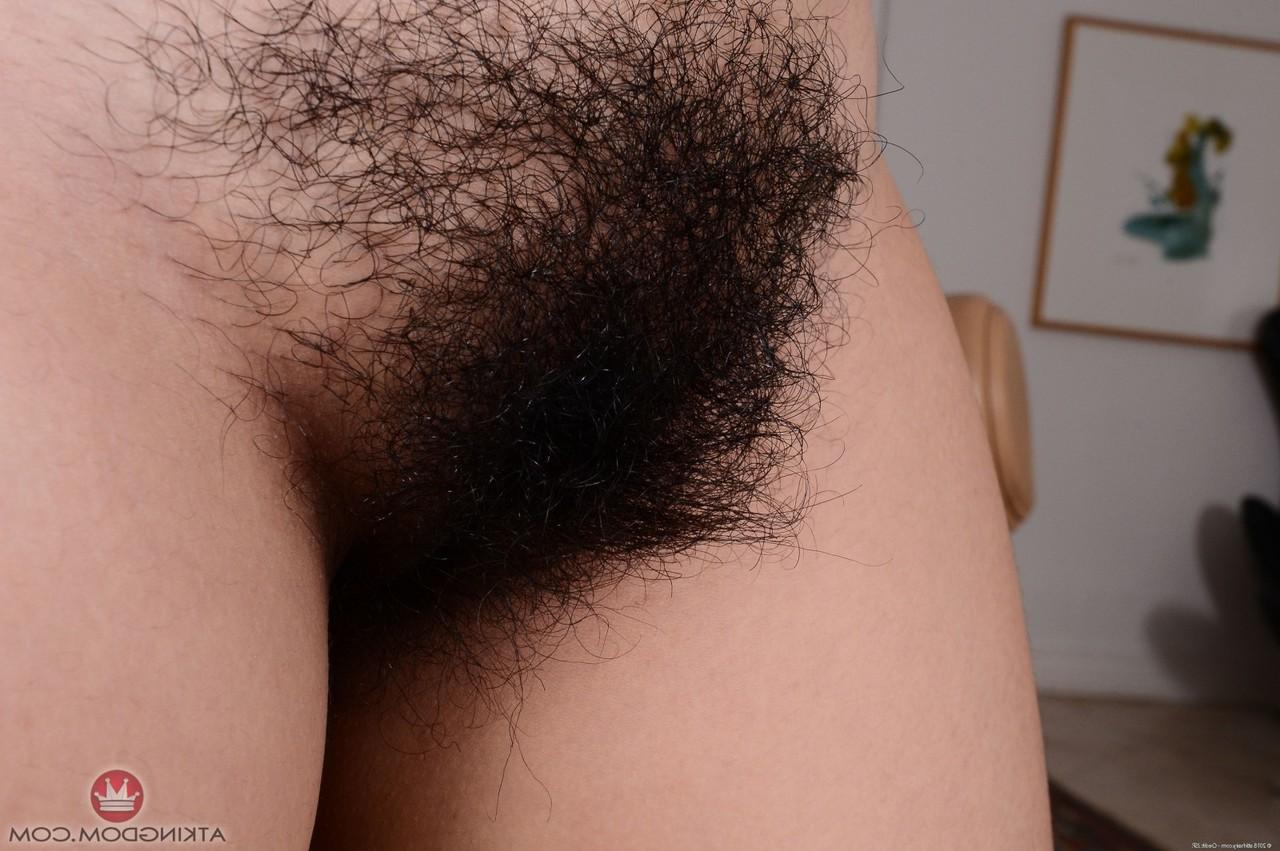 20P Cute Latina Nenetl Avril spreads her juicy ass cheeks and her hairy pussy lips