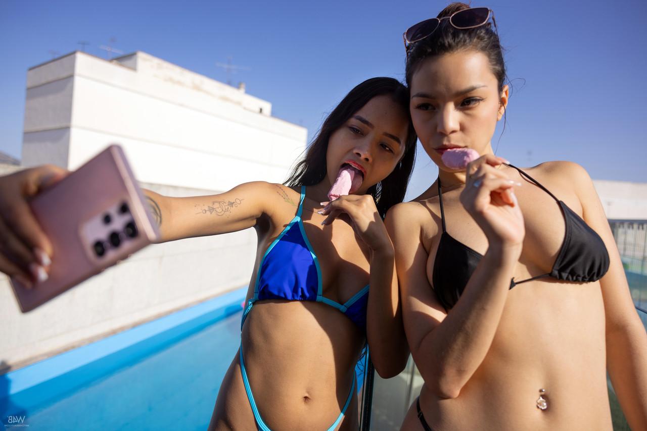 20P Pretty babes Liloo & Sky Moon show off their teen tits and big bums outdoors