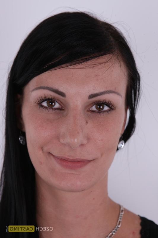 20P Dark haired amateur Sylva takes a seat on a stool after getting totally naked