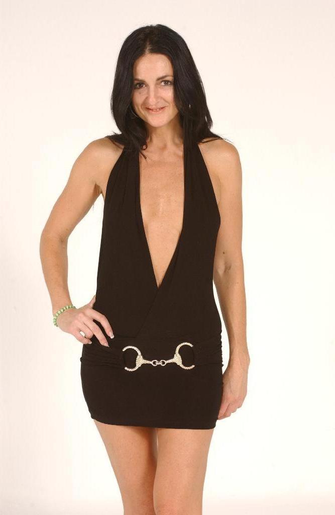 18P Brunette MILF Lake Russell sets her natural tits free of a short dress