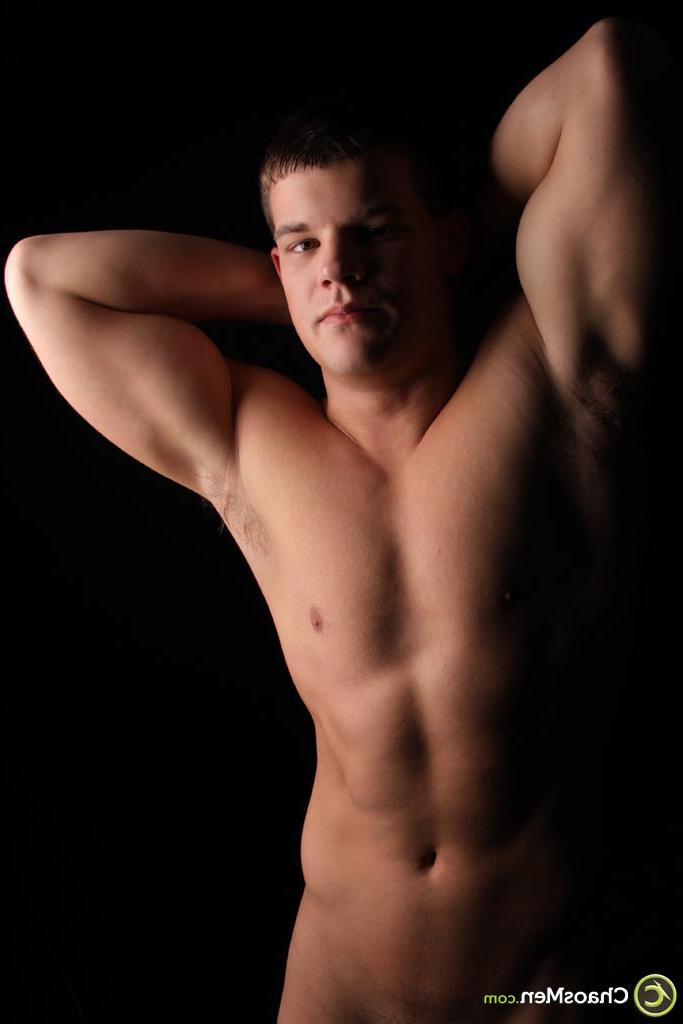 20P Muscular guy Dwight strips fully naked and shows off his suckable hard cock