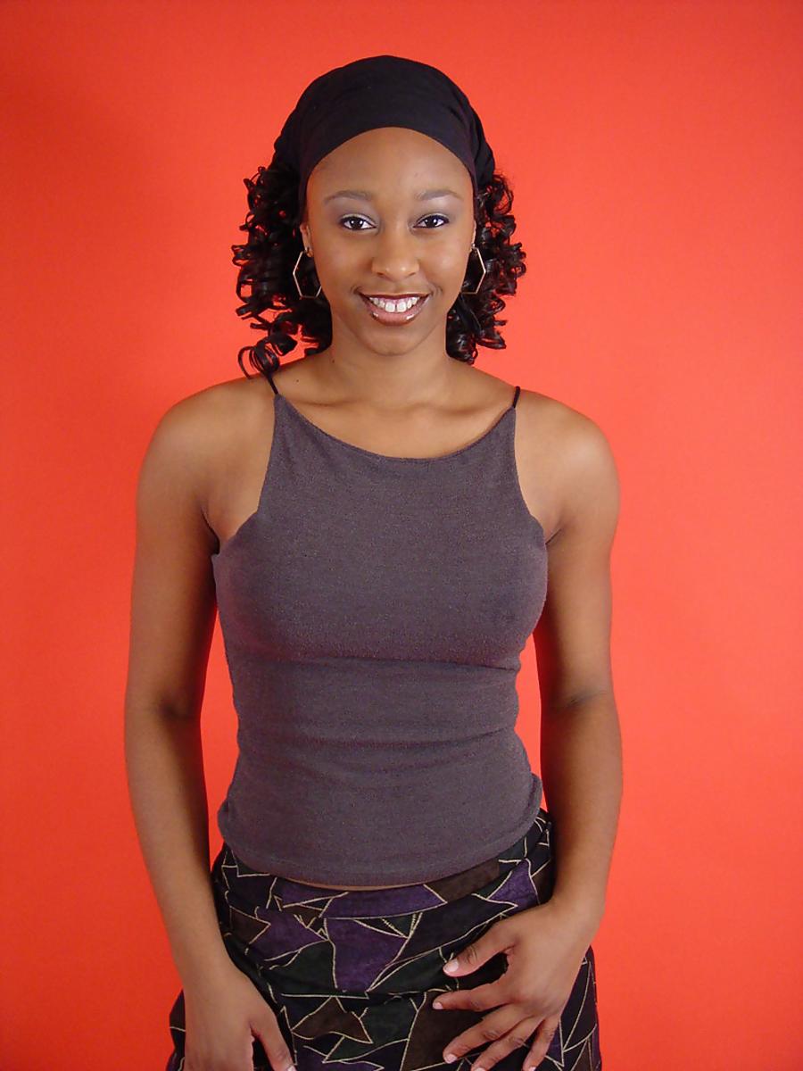16P Ebony chick Shalia cusp her small boobs after stripping to thong underwear