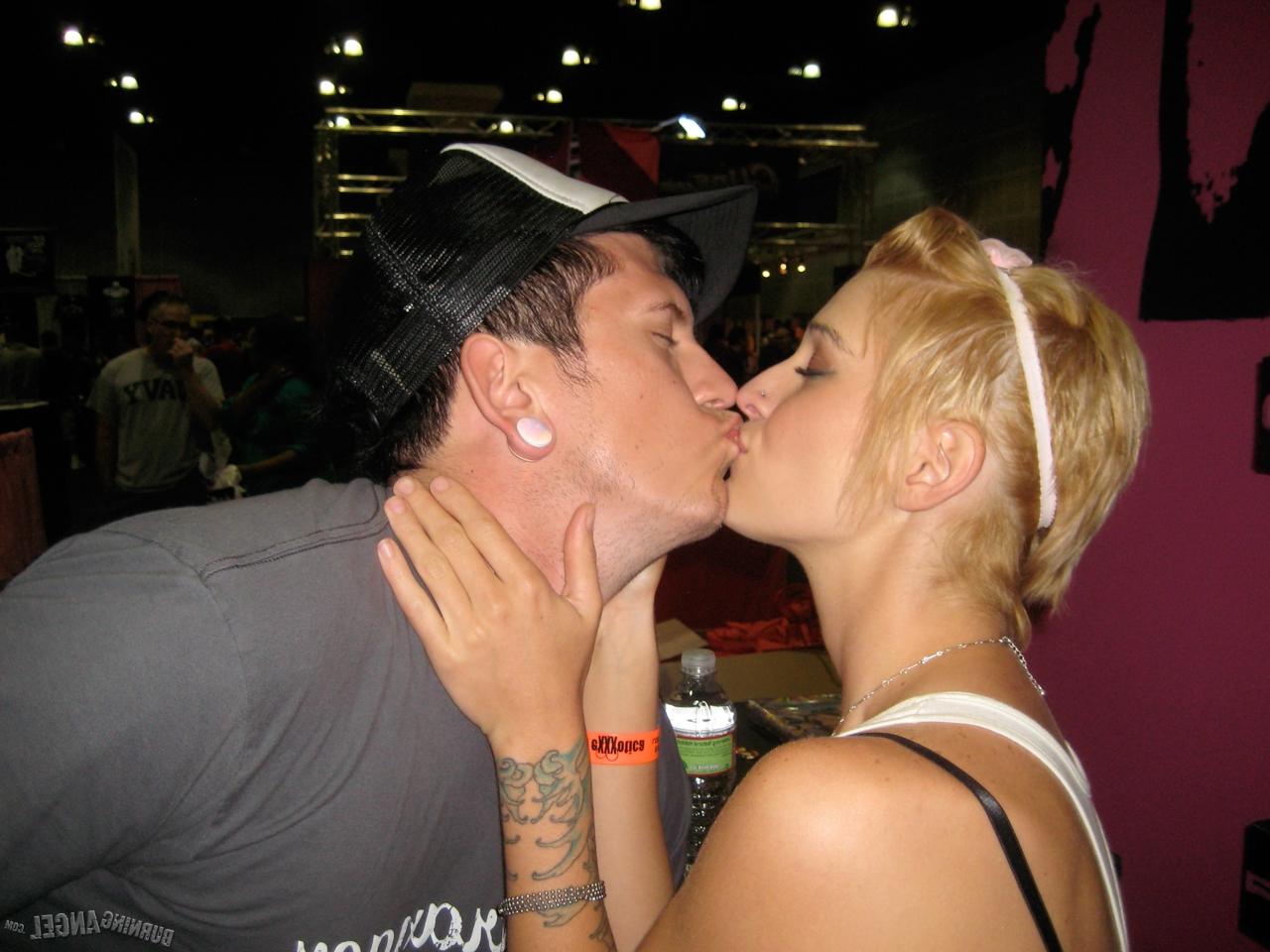 15P Clothed females with tattoos flash their butts while at a party