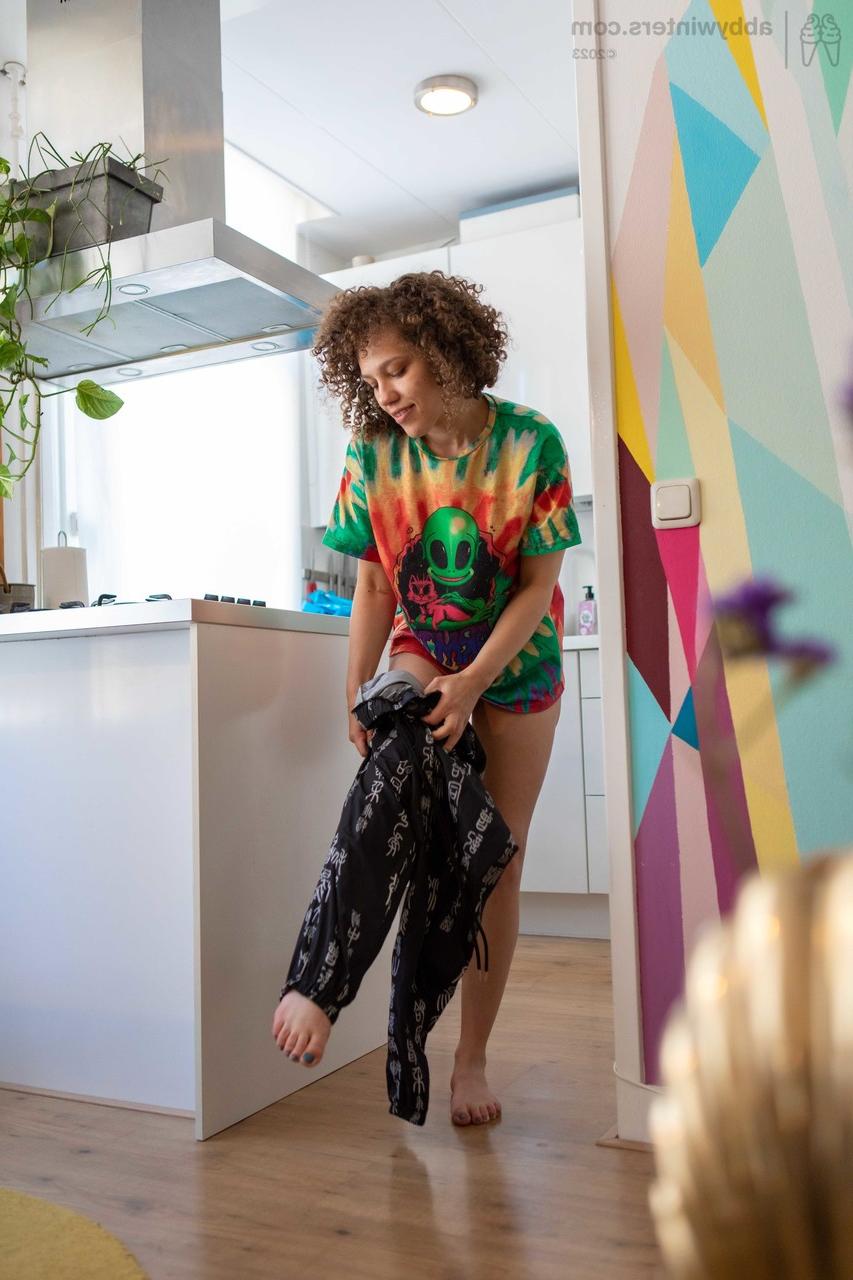 20P Adorable curly haired amateur Sasha F gets spied while putting her clothes on