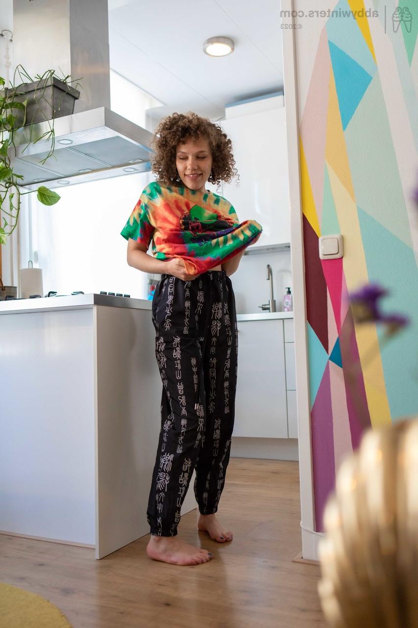 20P Adorable curly haired amateur Sasha F gets spied while putting her clothes on