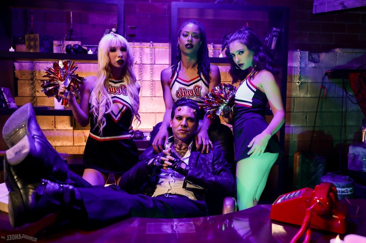 15P Three cheerleaders partake in a reverse gangbang with a tattooed man