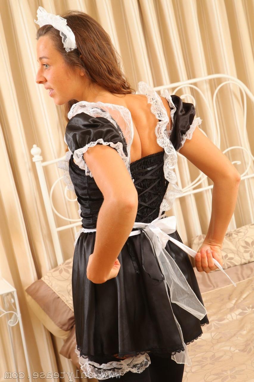 20P Adorable brunette maid Esmee takes off her uniform and shows her hot figure