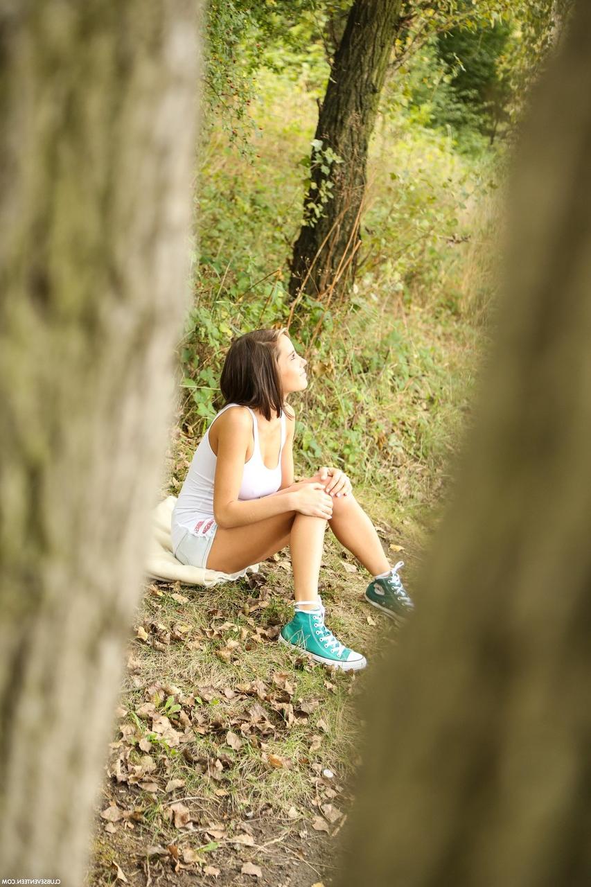 17P Stunning Anabelle with big natural tits strips and toys herself in the woods