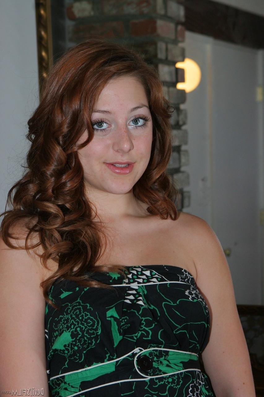 20P Redhead cutie with small tits Rose E plays with her monster toys