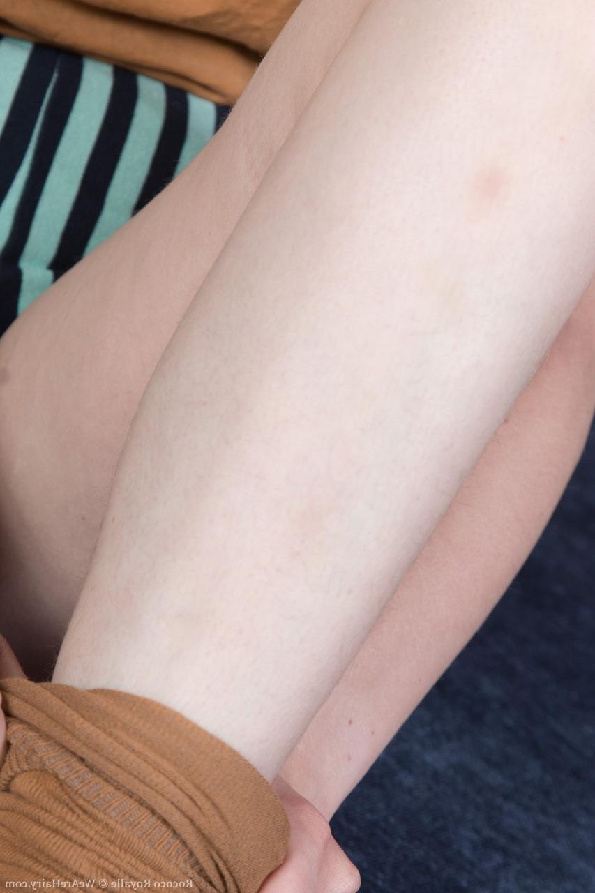 17P Pretty redhead with natural tits Rococo Royalle reveals her hairy twat