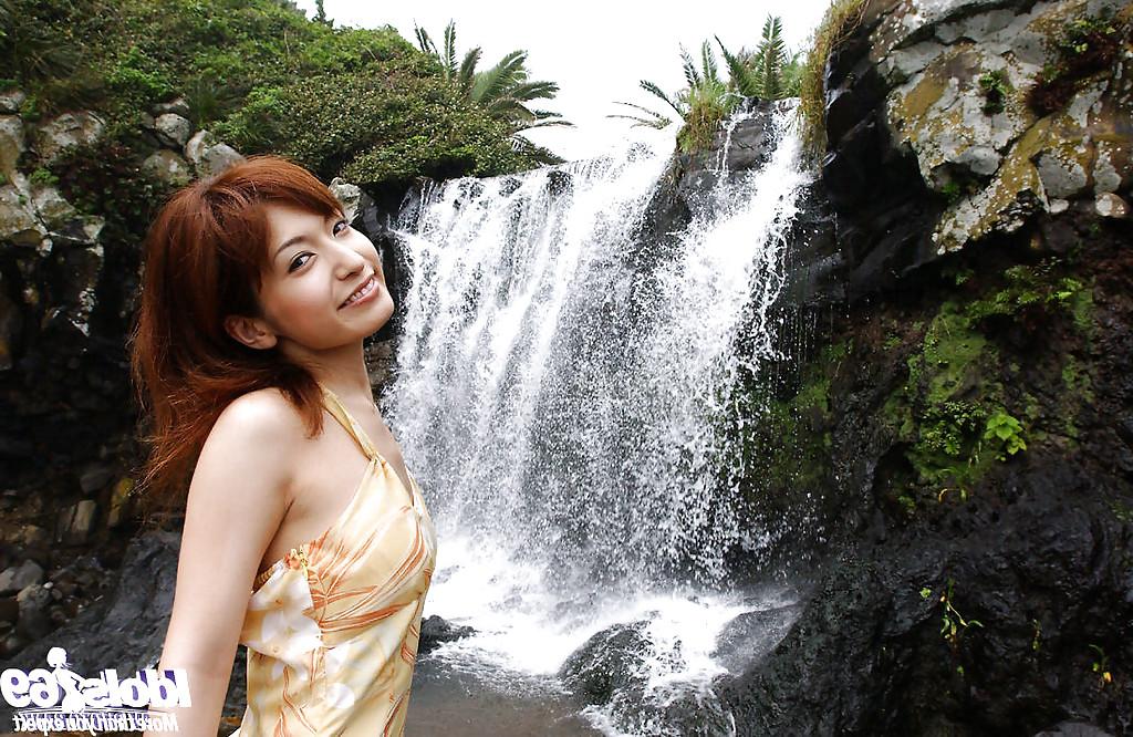 16P Redhead asian babe An Nanba stripping off her clothes outdoor