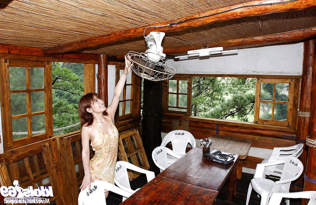 16P Redhead asian babe An Nanba stripping off her clothes outdoor