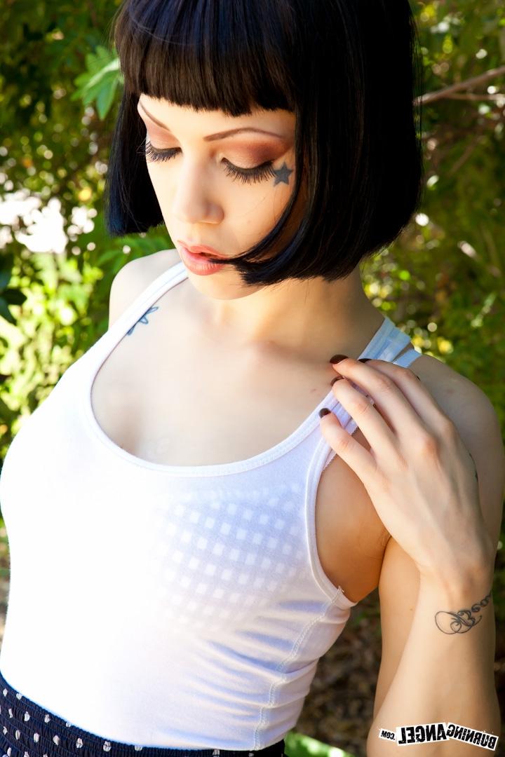 17P Slender petite fetish model disrobes in the sunshine to finger her horny pussy