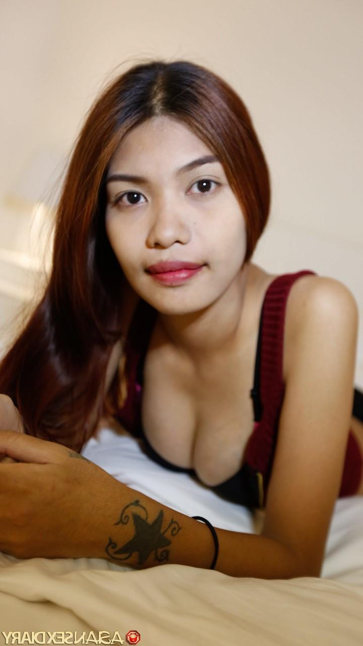 20P Slender Asian babe Nanda ends a sexy striptease with some POV hardcore sex