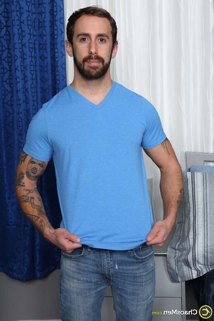 20P Gay brunette Kurt Langdon strips and shows his inked body, big ass & uncut rod