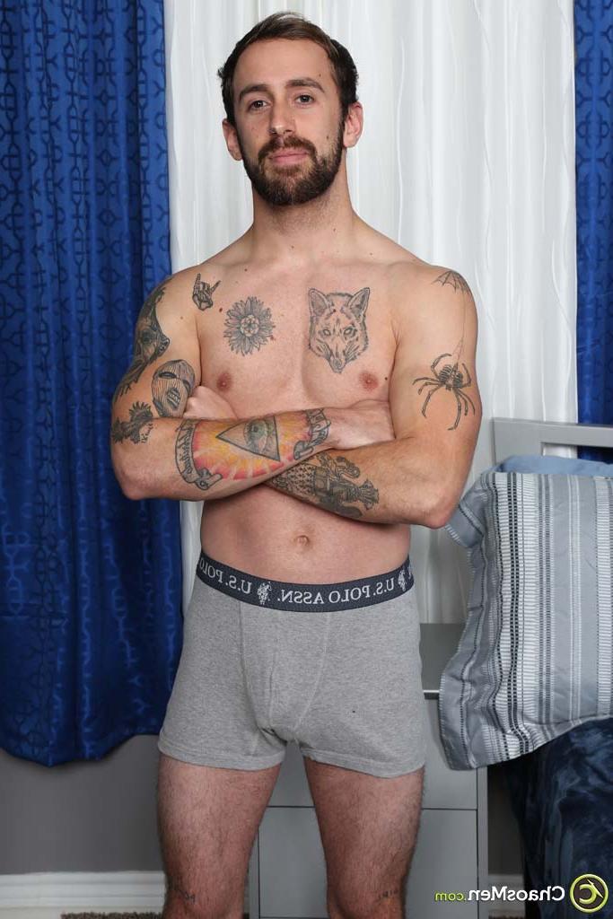 20P Gay brunette Kurt Langdon strips and shows his inked body, big ass & uncut rod