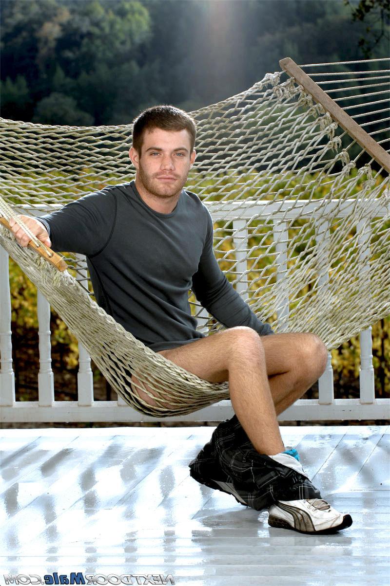 20P Handsome stud Trent Locke undressing & posing butt naked on the swing outside