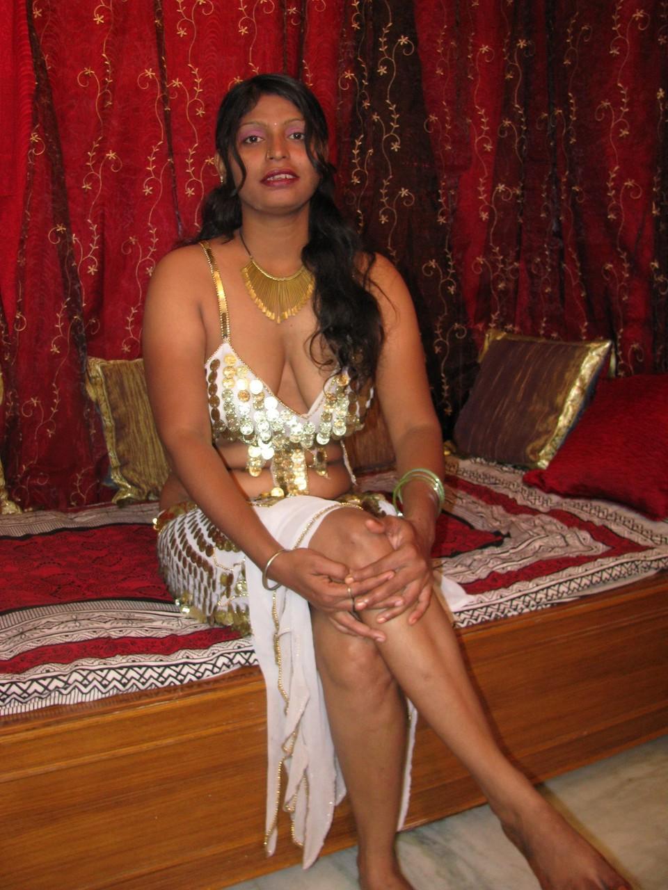 13P Indian MILF shows the pink of her shaved pussy during solo action