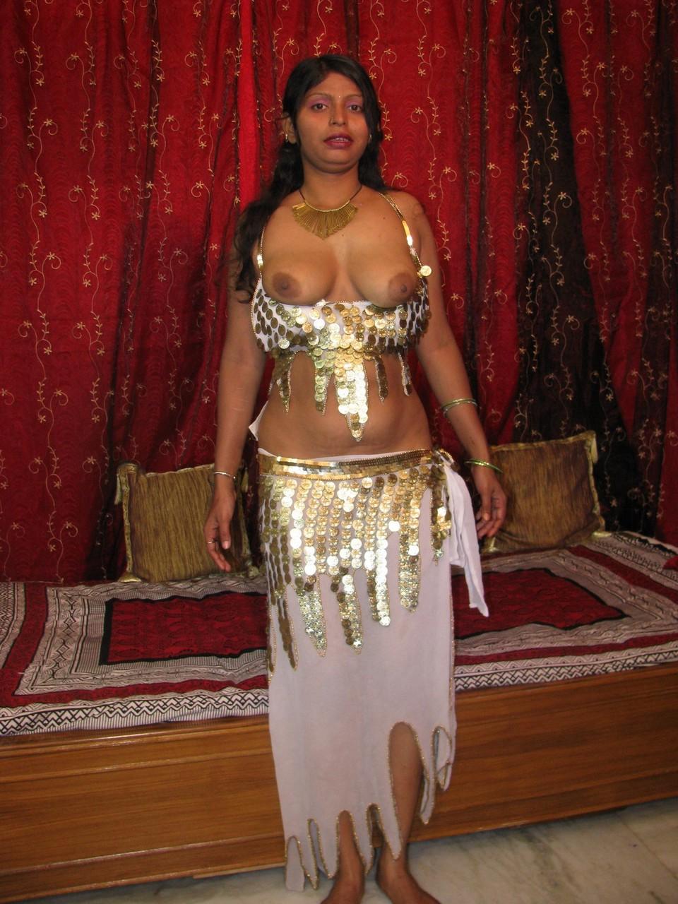 13P Indian MILF shows the pink of her shaved pussy during solo action