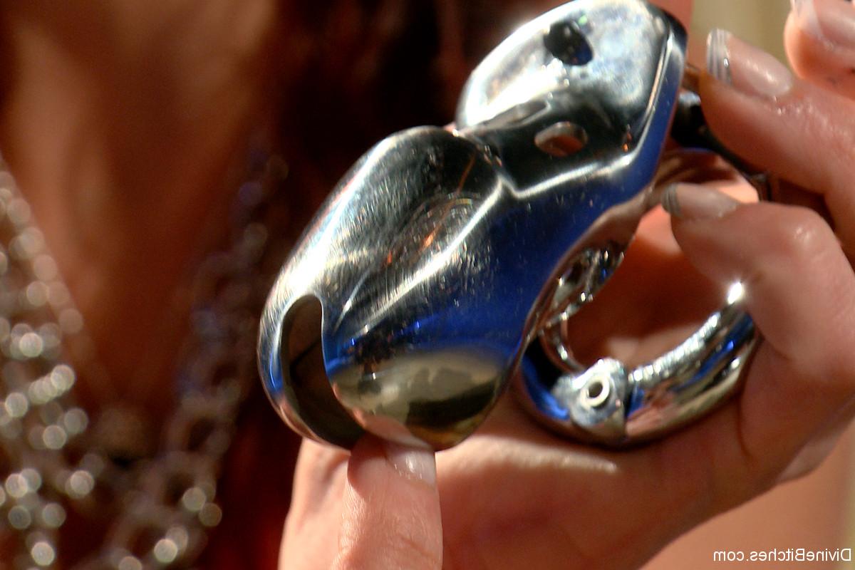 20P Kinky femdom Nicki Hunter teases with a metal male chastity belt in POV