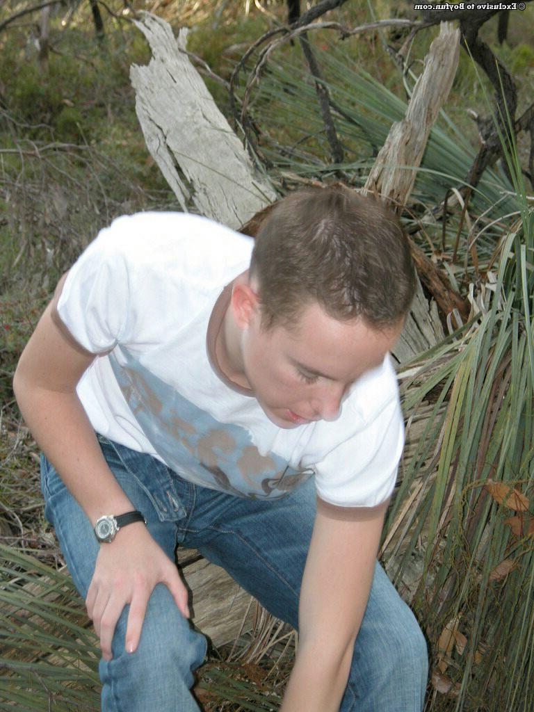 20P Petite white twink Zac undresses and poses naked against an old tree