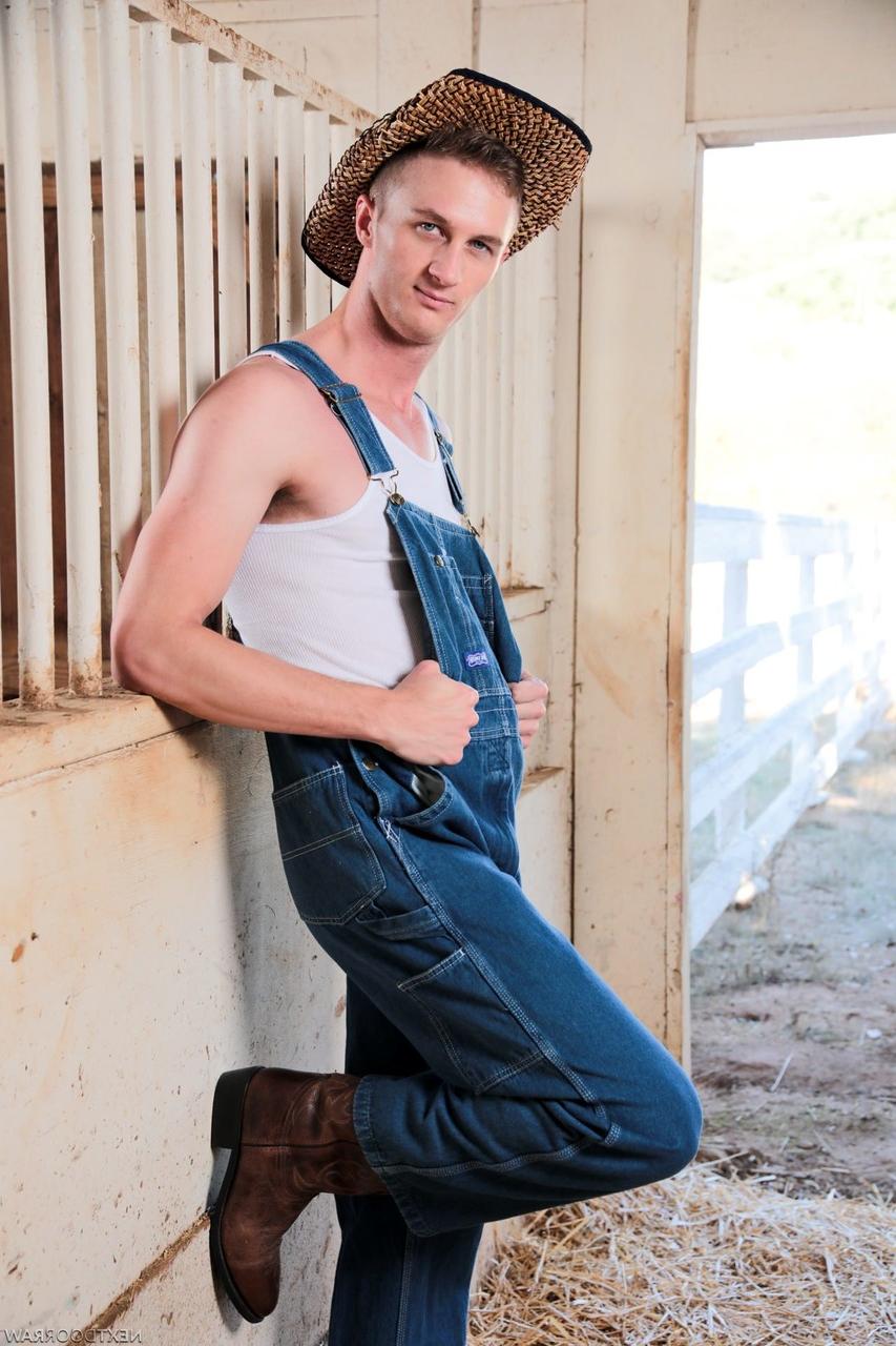 20P Two cute farmers Elye Black & Ty Derrick having doggy sex in the barn