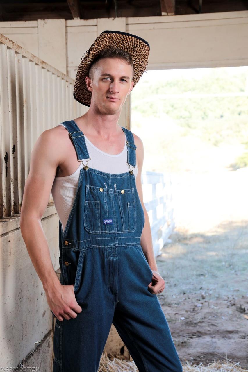 20P Two cute farmers Elye Black & Ty Derrick having doggy sex in the barn