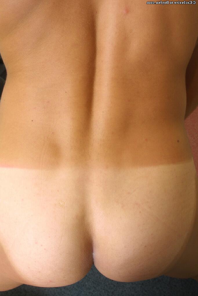 20P Cute gay model Joseph strips, shows his tanned body and jerks off in a solo