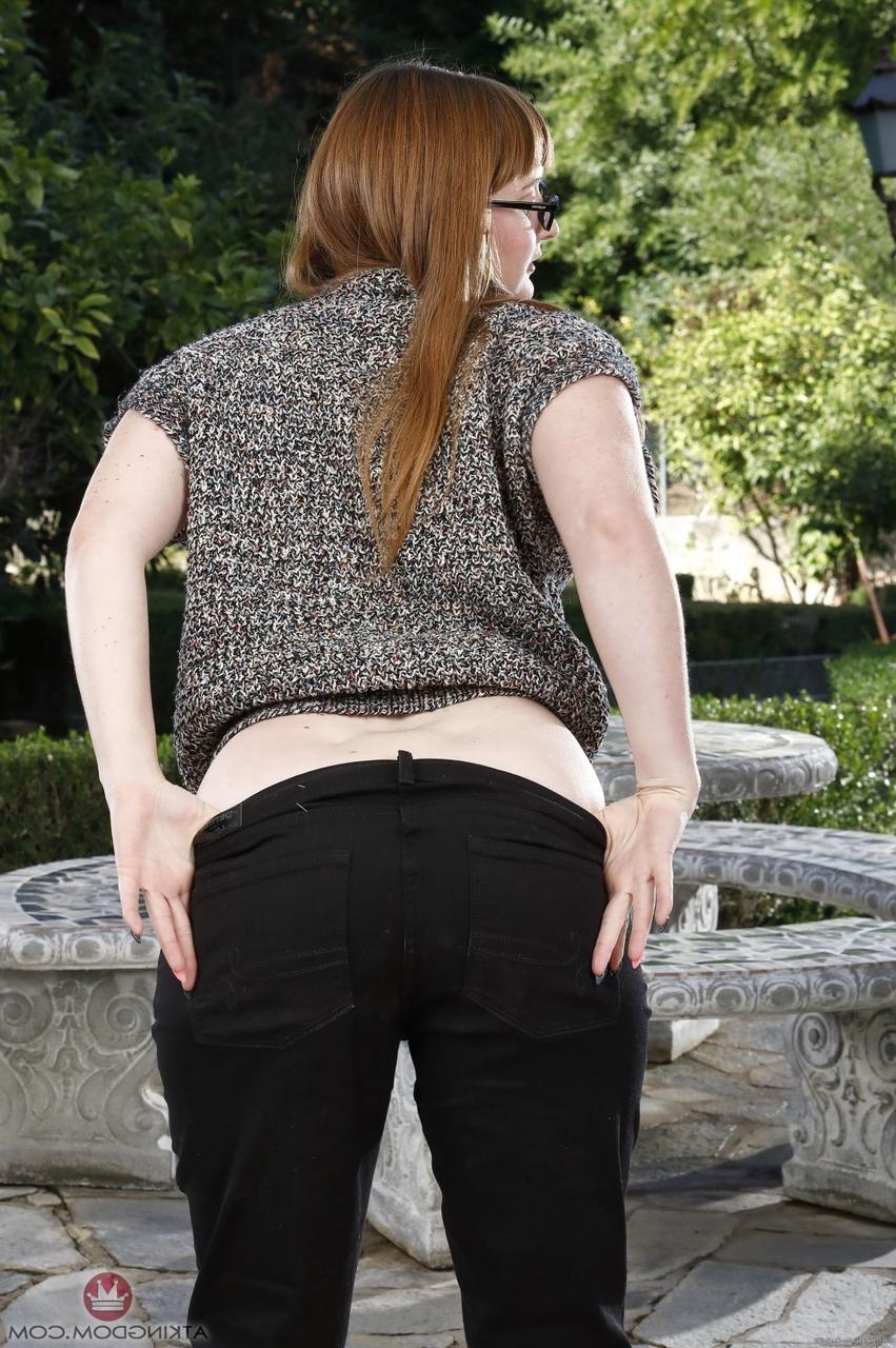 18P Nerdy Thelma Sleaze in glasses peels jeans for hairy pussy closeup at the park