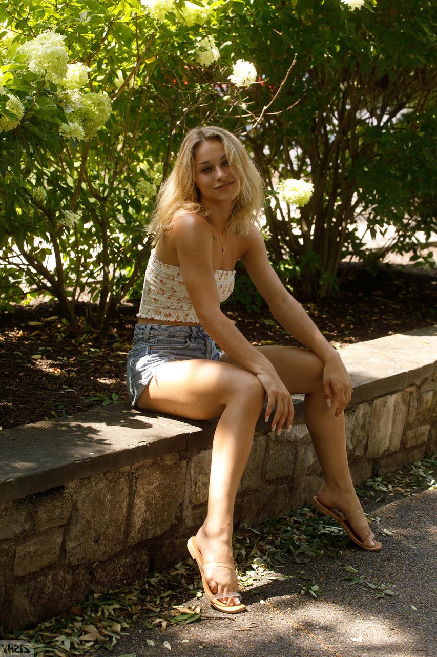 13P Hot babe Jezebel Madd shows off her hot legs wearing booty shorts outdoors