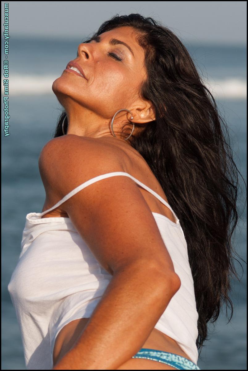 15P Brunette bodybuilder Tara Caden poses in a wet spaghetti strap shirt