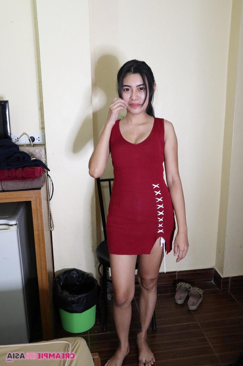 20P Exotic Asian babe Pin strips off her clothes and poses naked at a casting