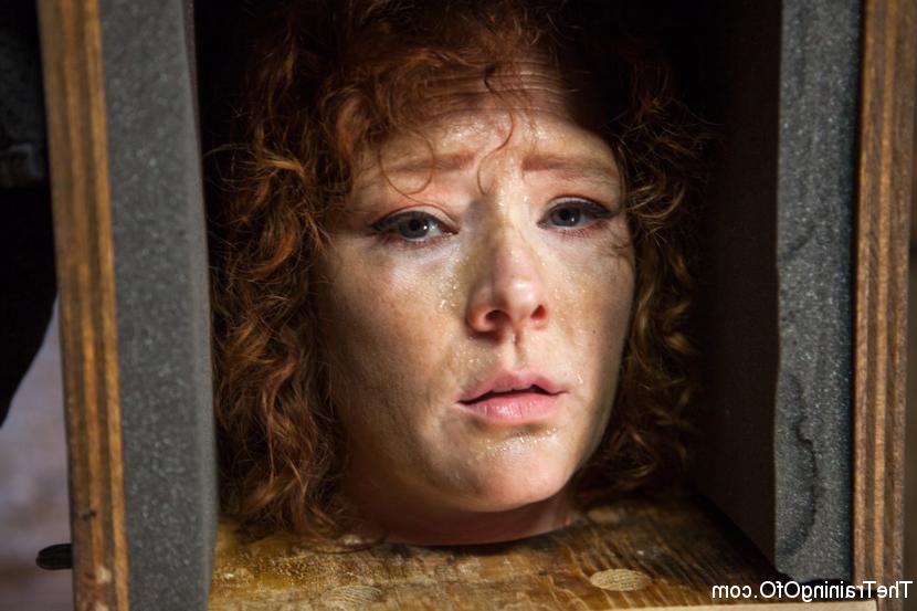 15P Middle-aged woman with curly red hair Audrey Hollander receives slave training