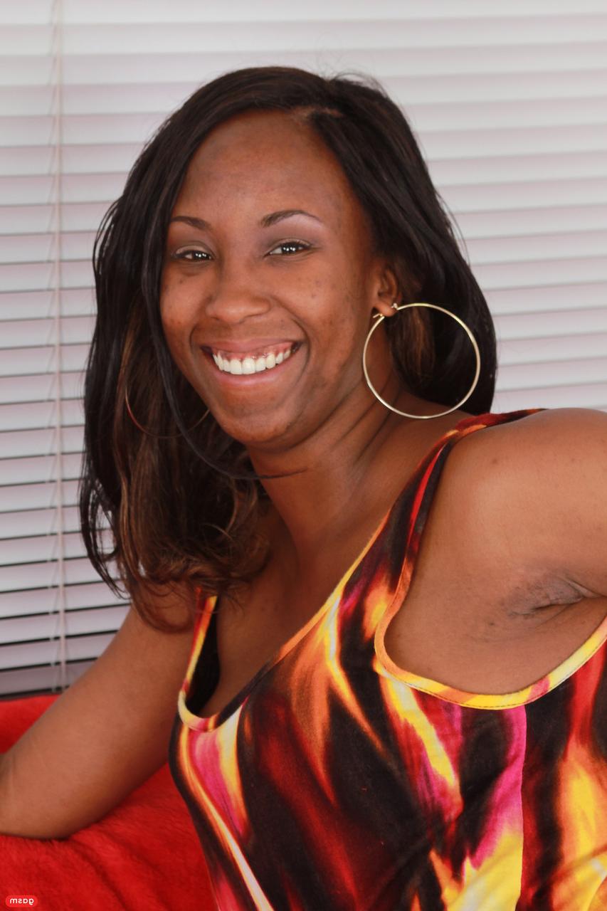 15P Cute ebony Imagine Lane teases with her bum wearing denim shorts