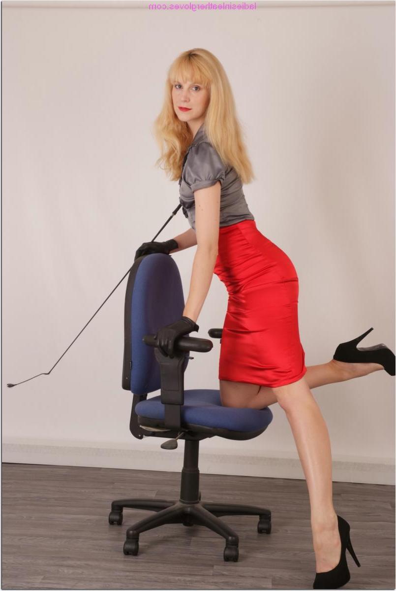 15P Fair skinned woman wields a whip in leather gloves during upskirt action