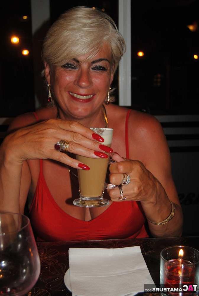 20P Busty hot mature Dimonty shows off her great legs & big tits in public