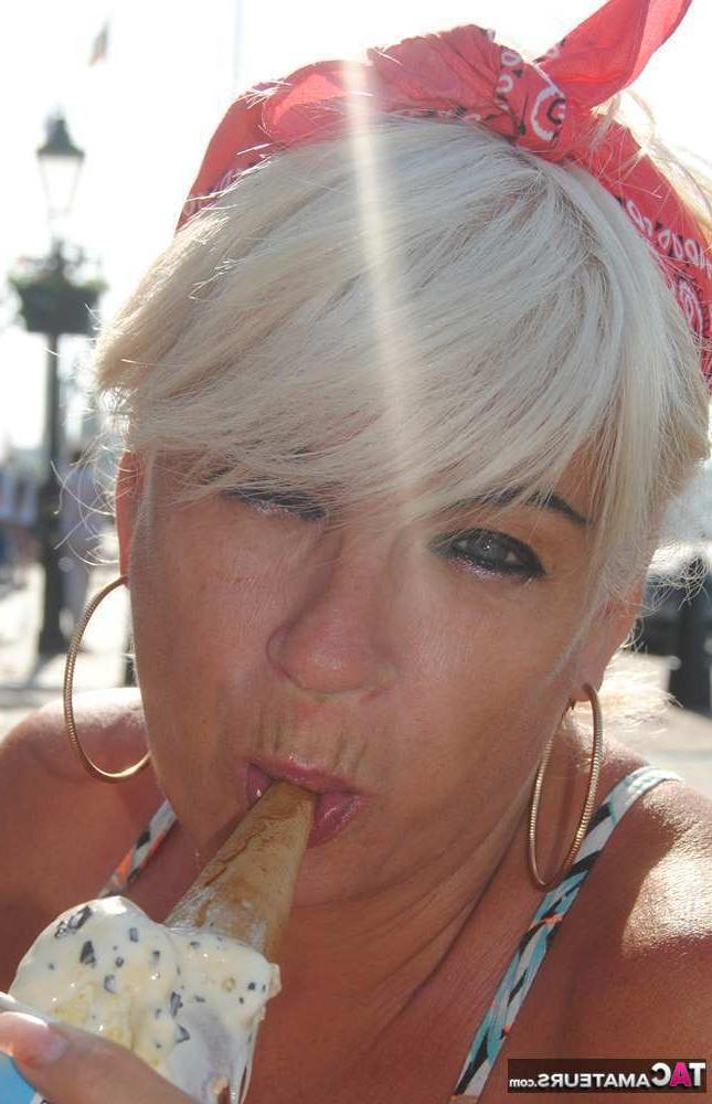 20P Busty hot mature Dimonty shows off her great legs & big tits in public