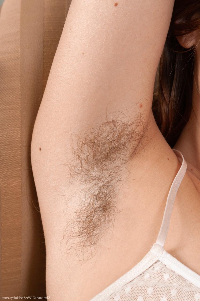 20P Beautiful hairy model Simone flaunts her unshaved legs and super fuzzy clit